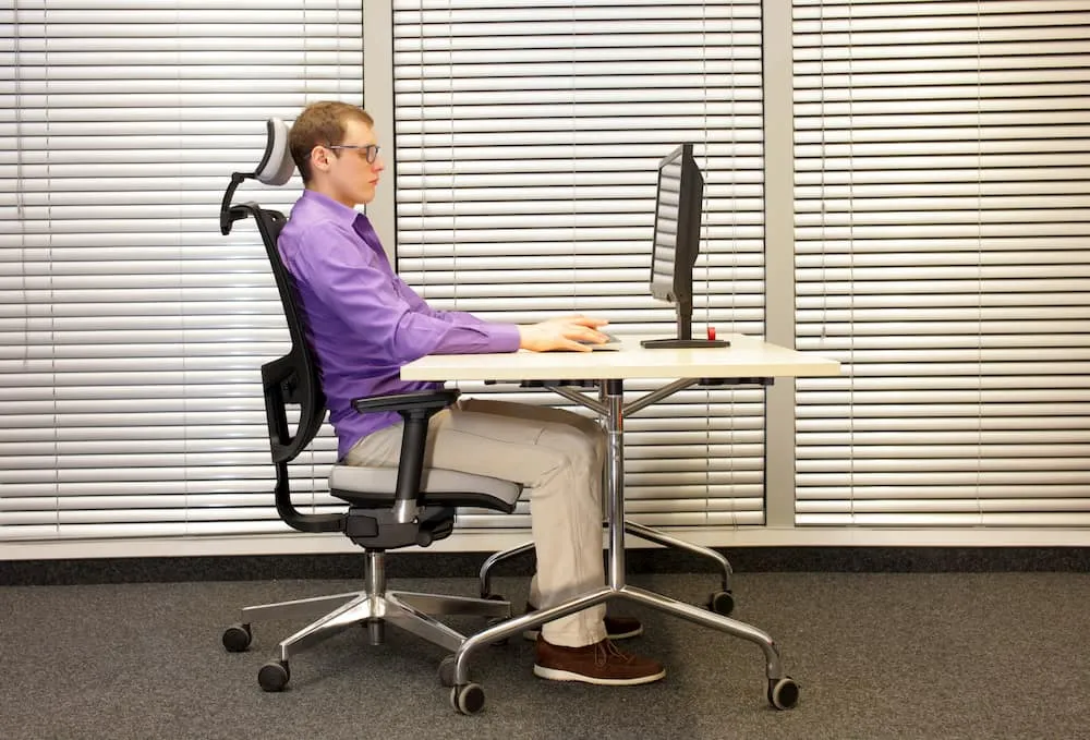 Desk with notebooks and peripherals arranged for measurement notes